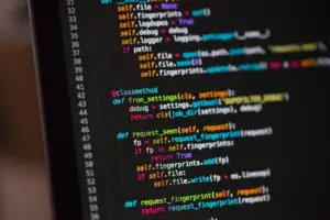 Python code on a laptop screen with unit test file open