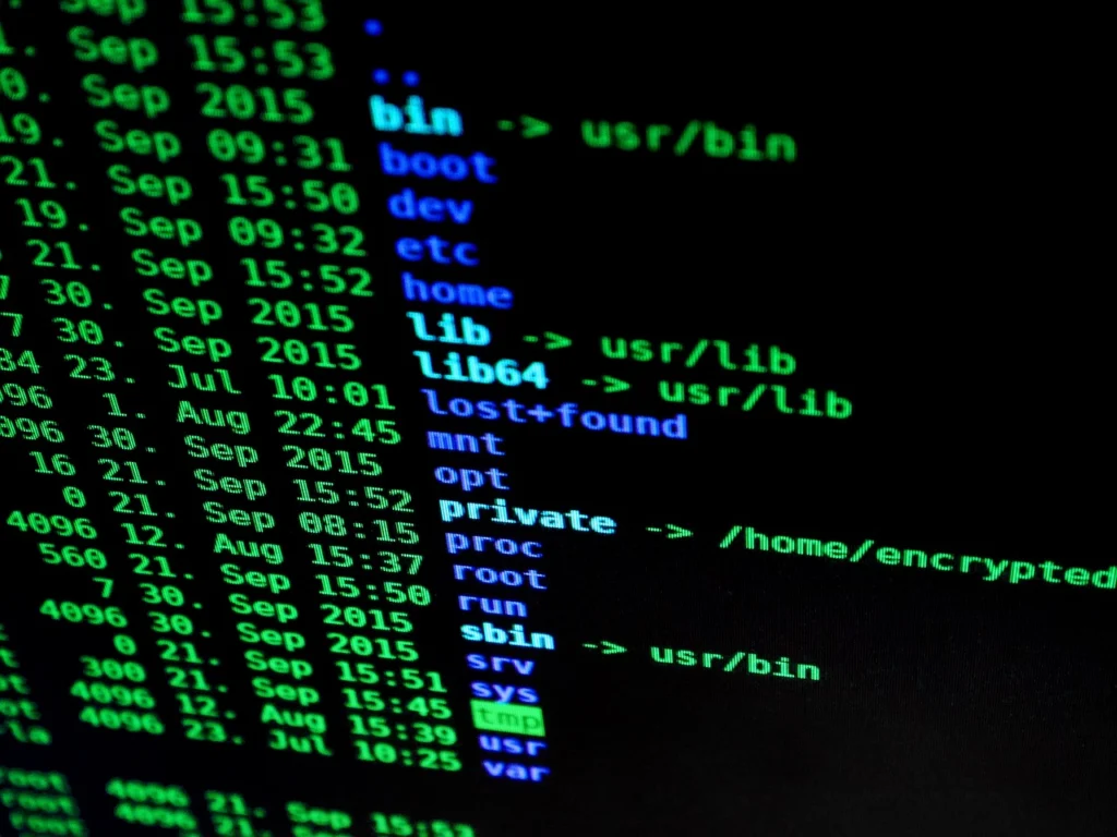 code terminal showing database migration progress on a computer monitor
