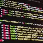 Developer writing Infrastructure as Code on a laptop